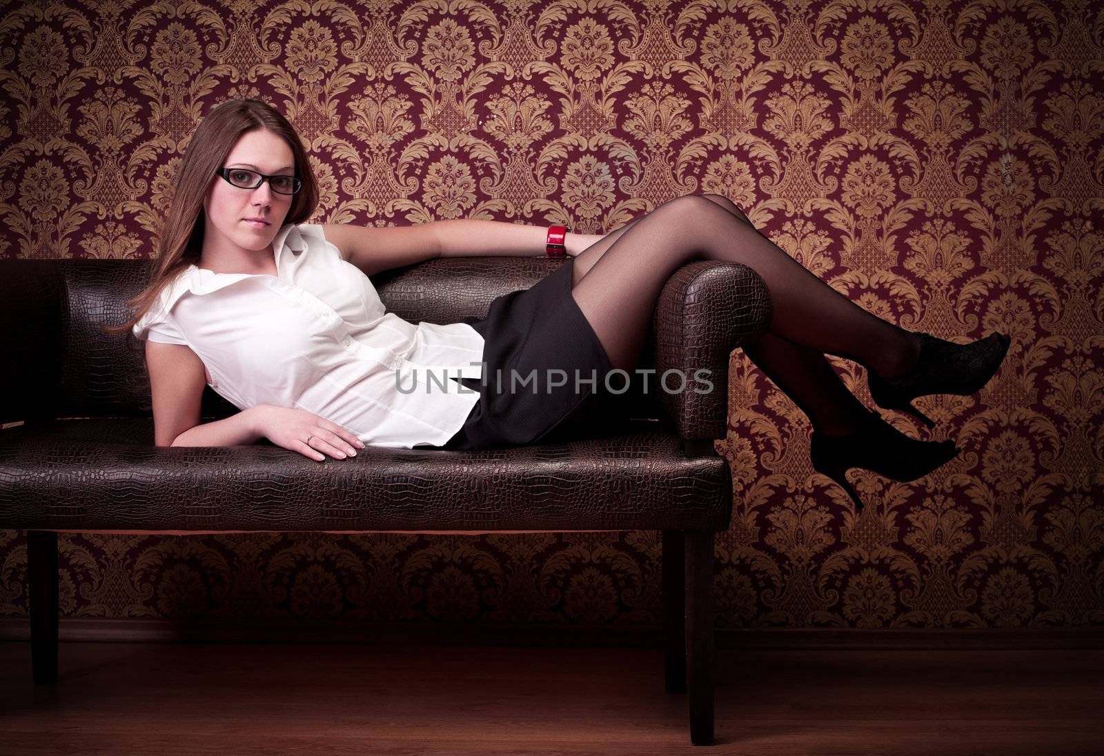 girl laying on sofa by petr_malyshev