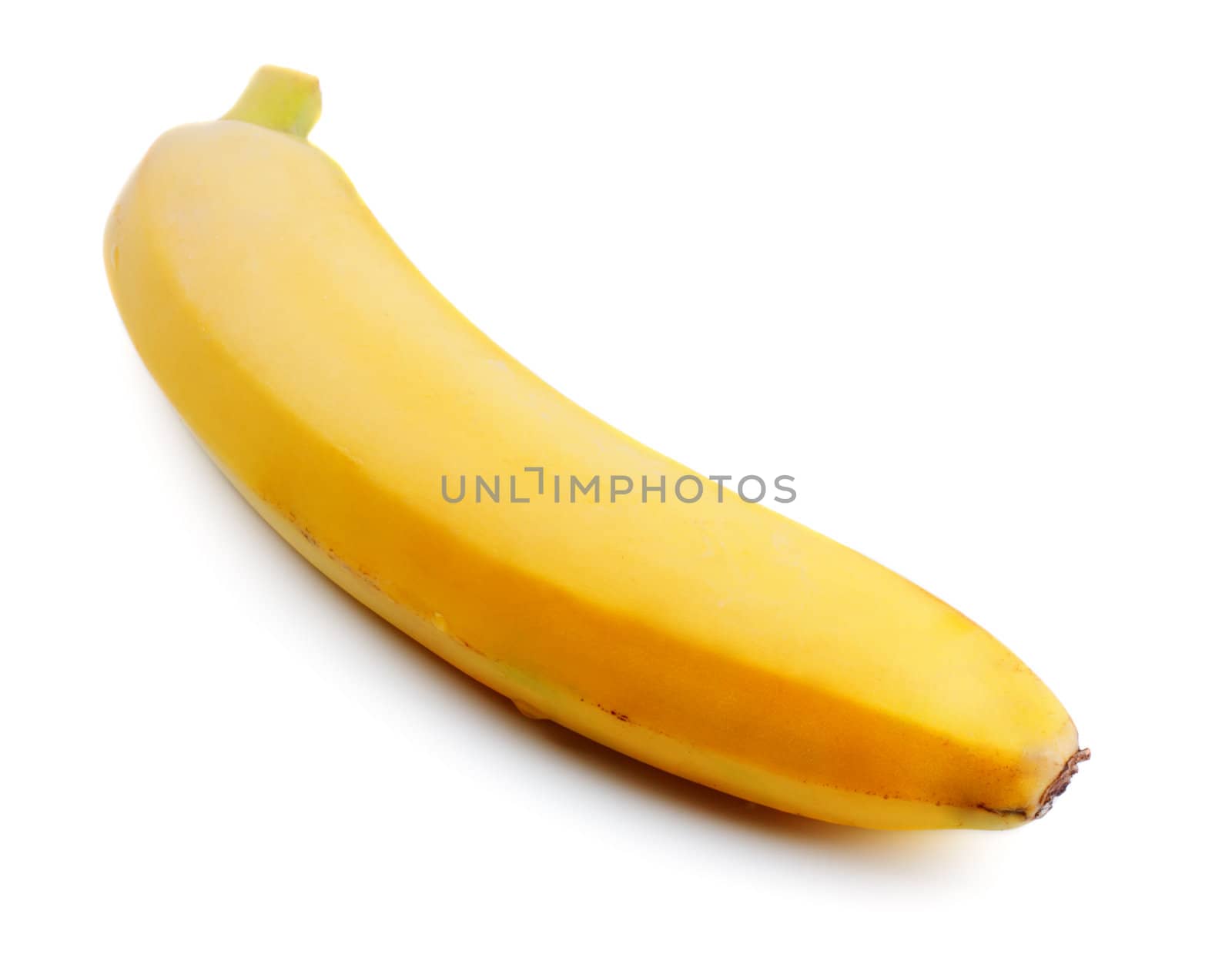 single yellow banana isolated on white background