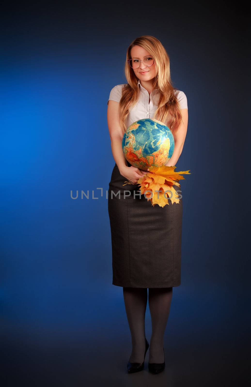 pretty teacher with globe and maple leaves by petr_malyshev