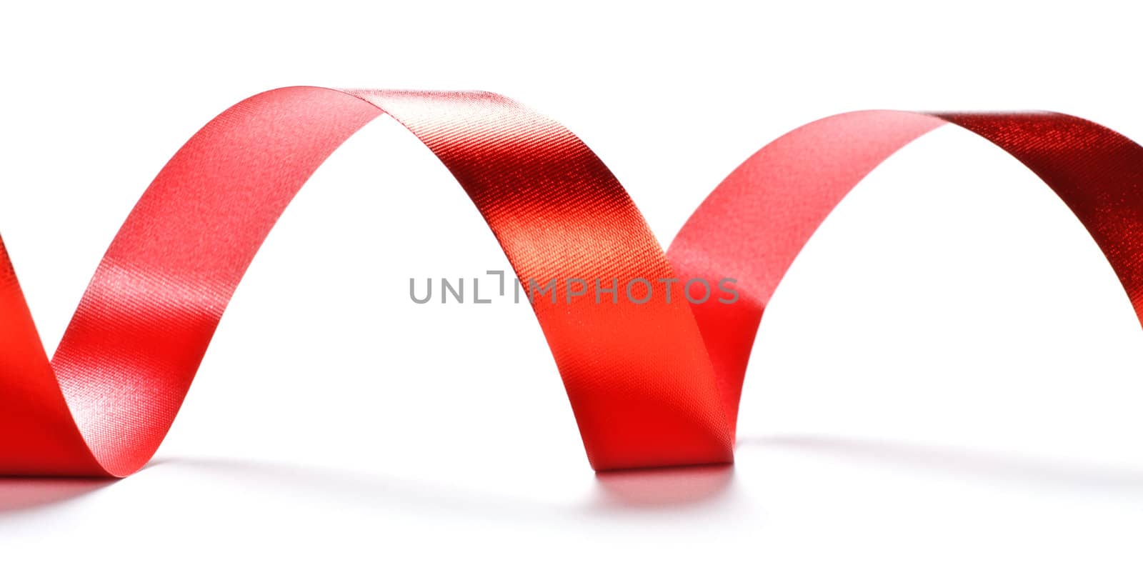red ribbon serpentine isolated on white background