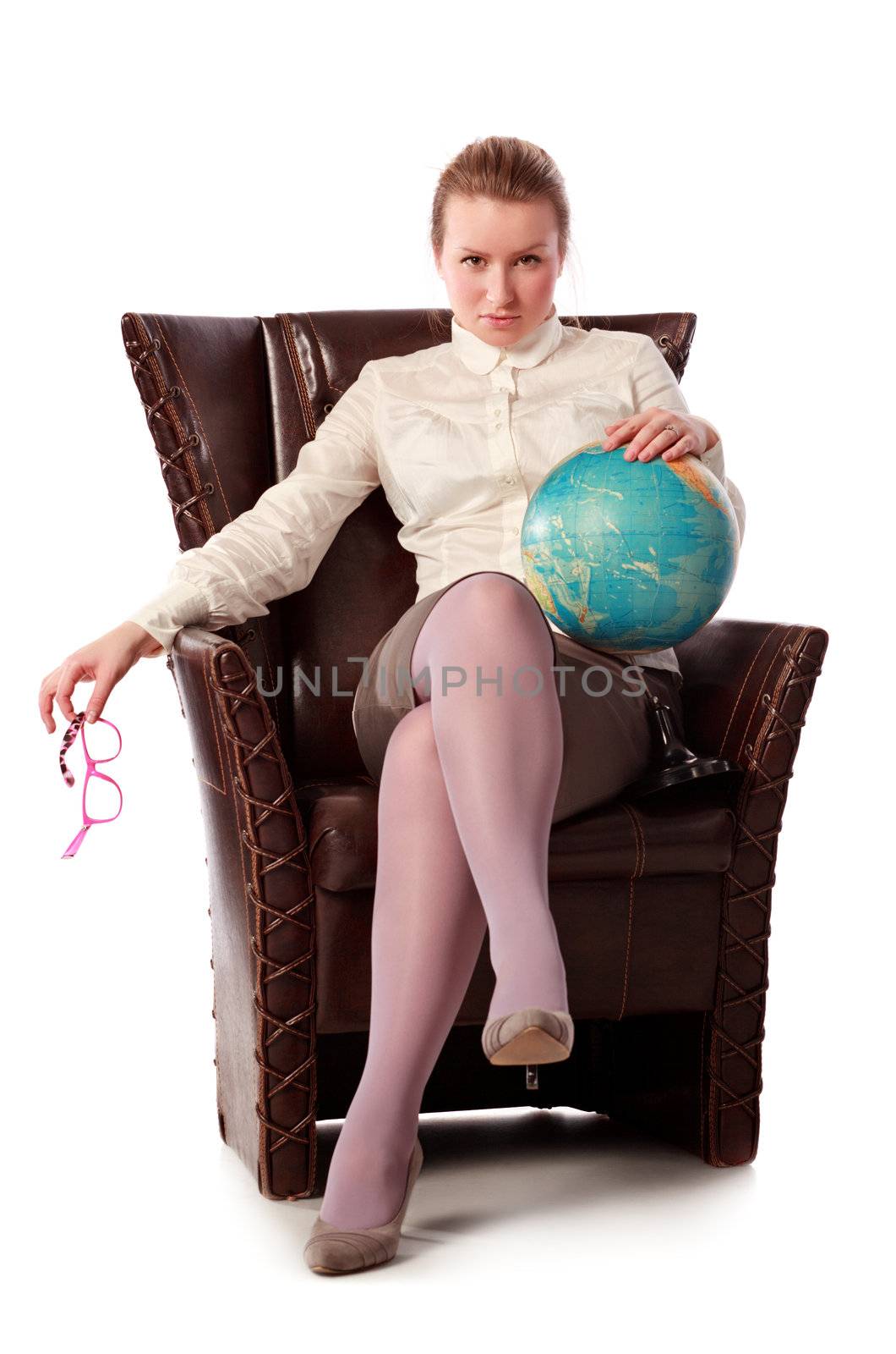 pretty female teacher sitting in armchair, isolated on white