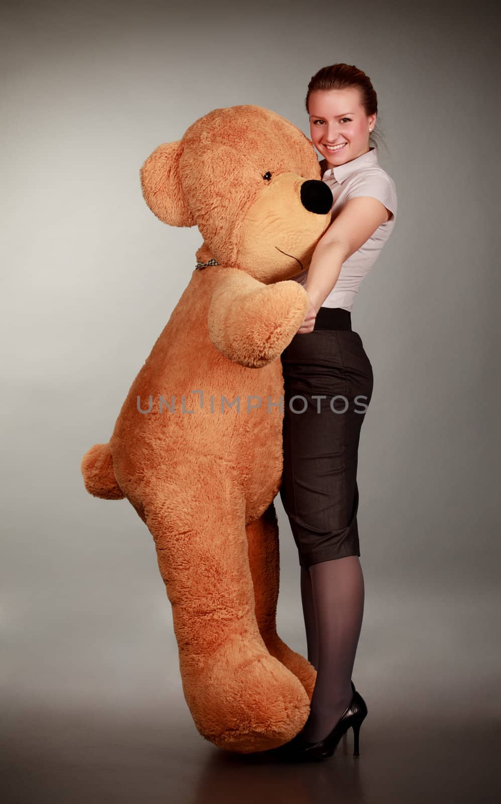 girl dancing with toy bear by petr_malyshev