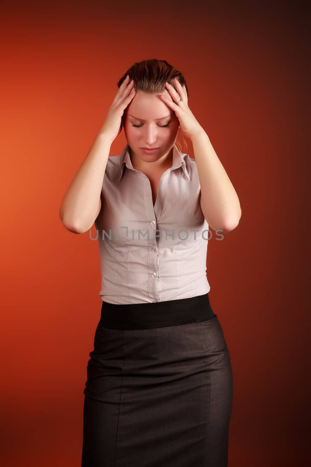 beautiful woman with headache on red background