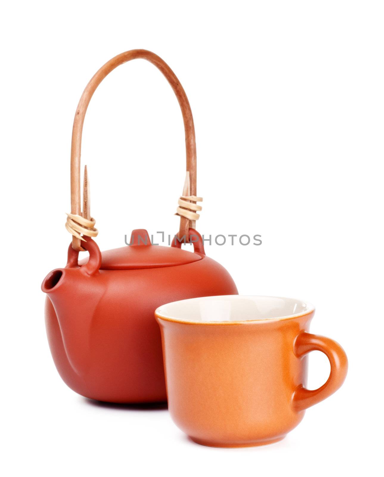 clay kettle and cup isolated on white