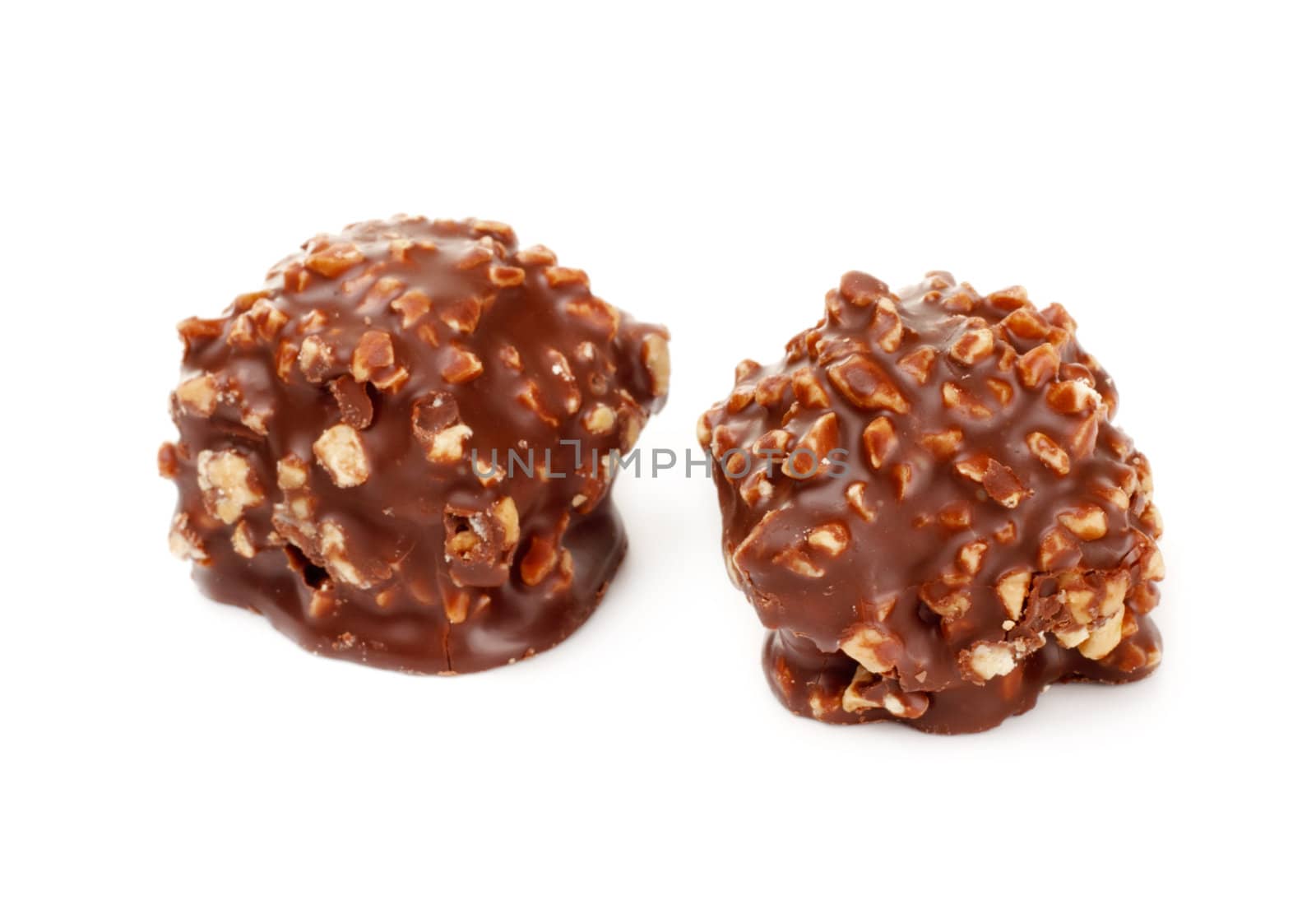 chocolate candy with nuts isolated on white