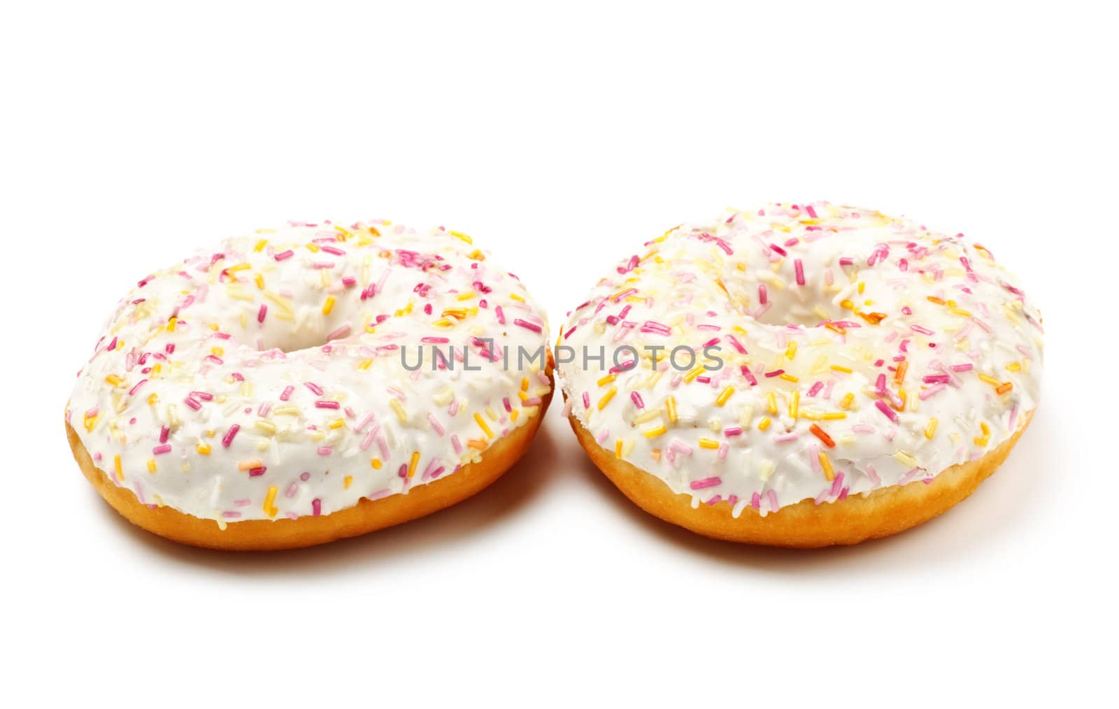 two sugar glazed donuts covered in sprinkles isolated on white