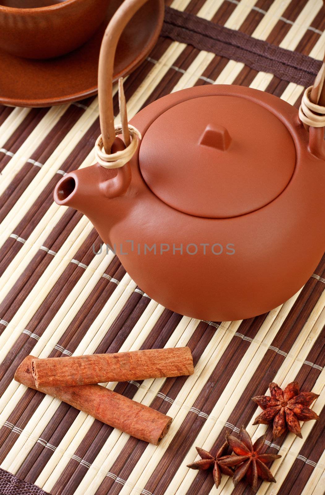 winter tea with cinnamon and star anise on bamboo napkin