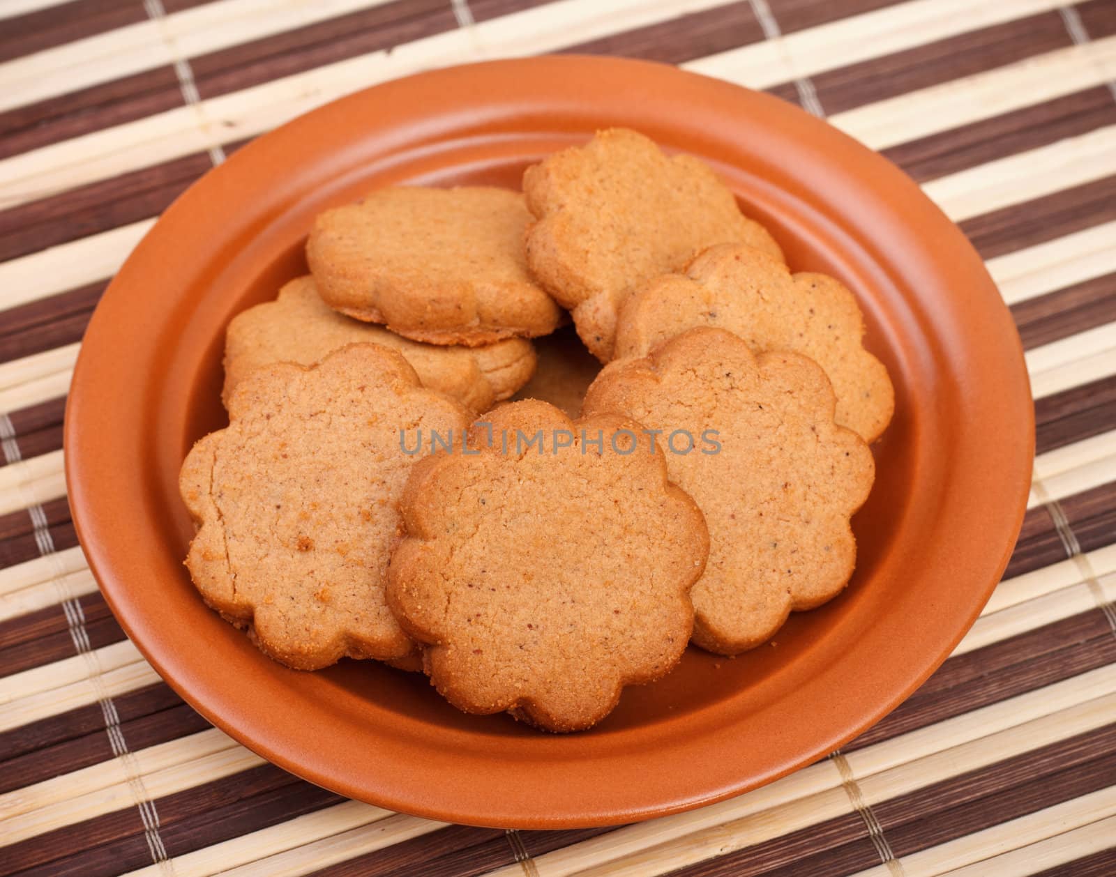 dish of cinnamon cookies on bamboo napkin