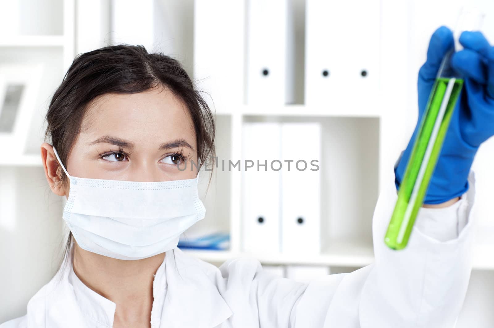 chemist working in laboratory with scientists equipment