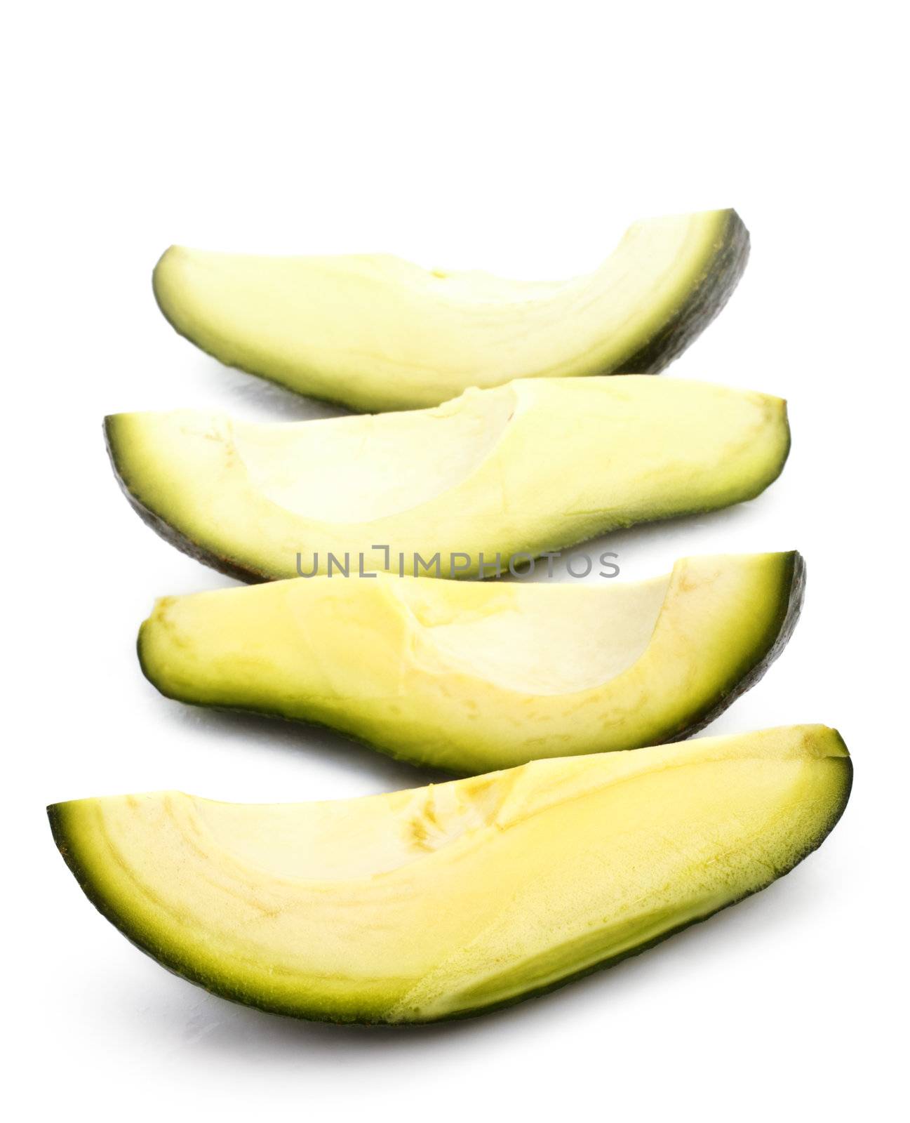 three avoсado slices isolated on white background