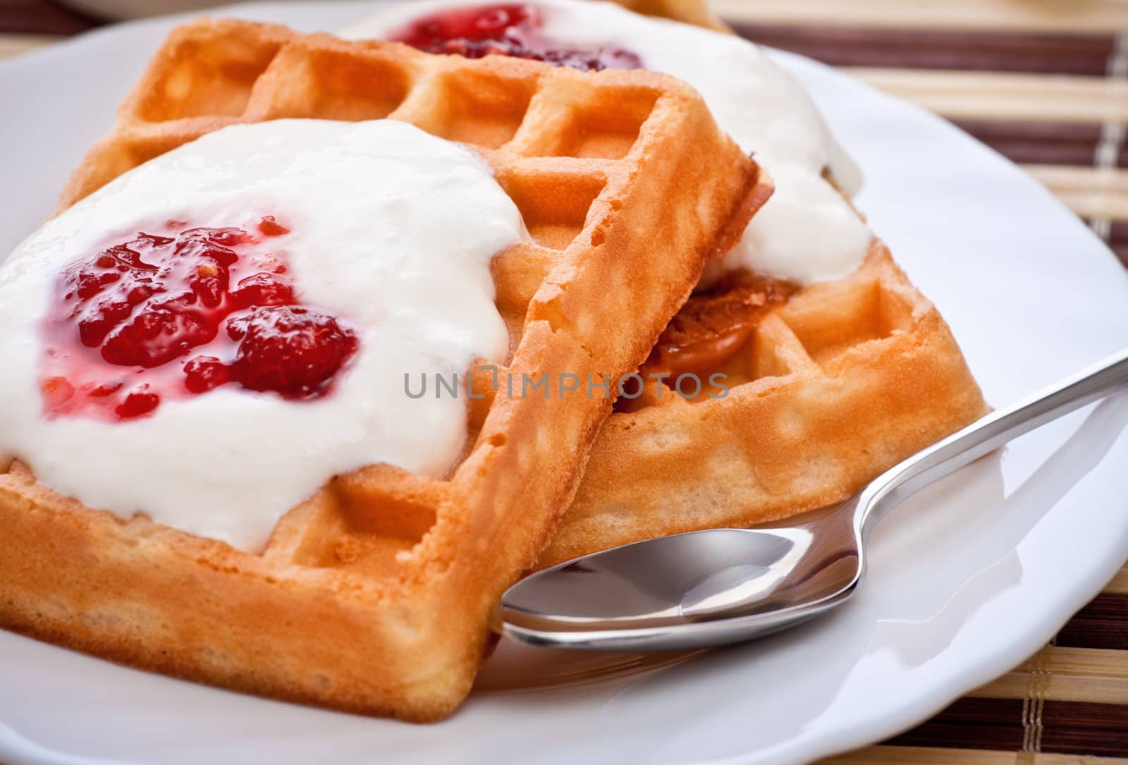 dessert with soft waffle and raspberry jam