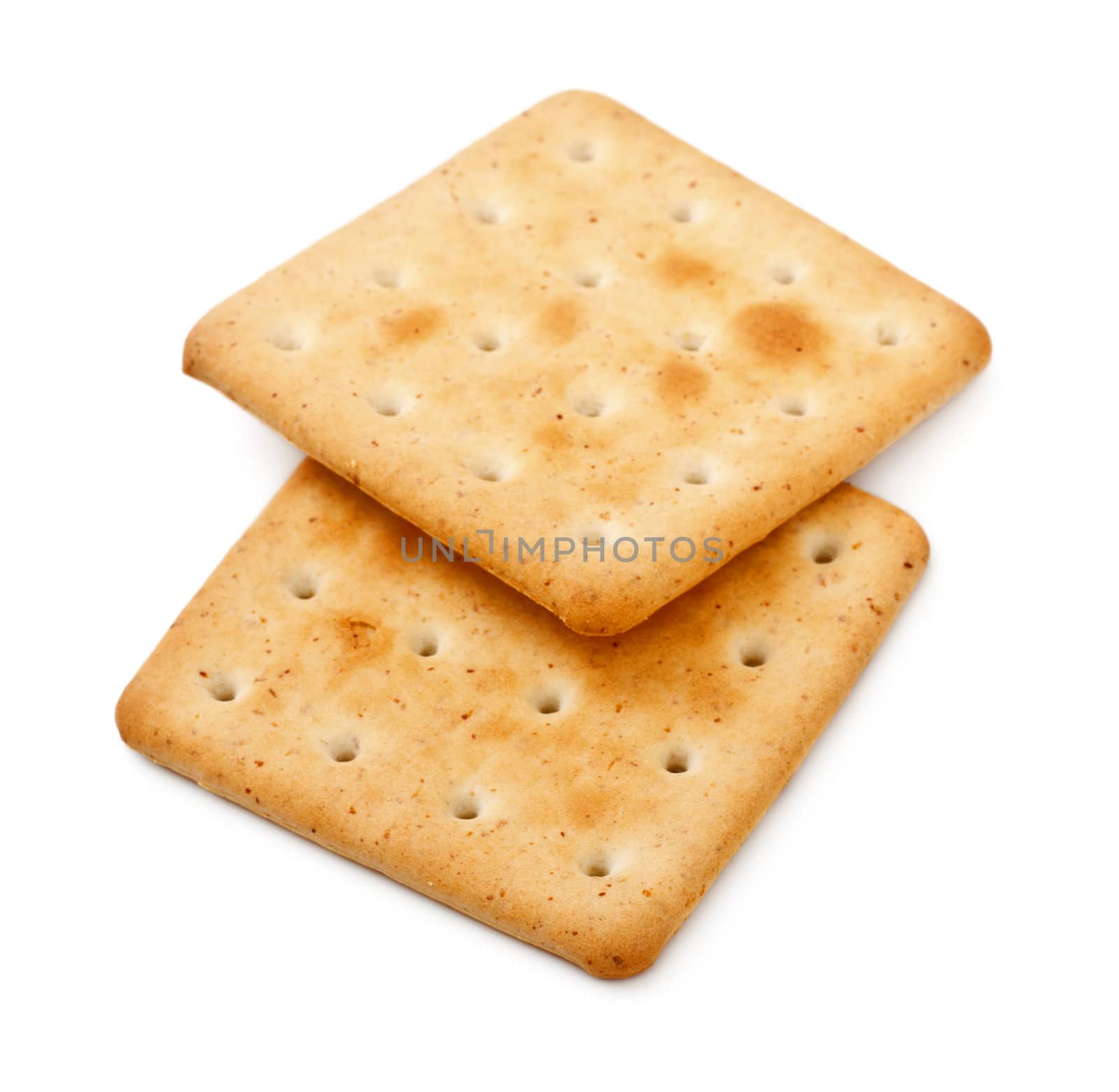 two salty crackers isolated on white background
