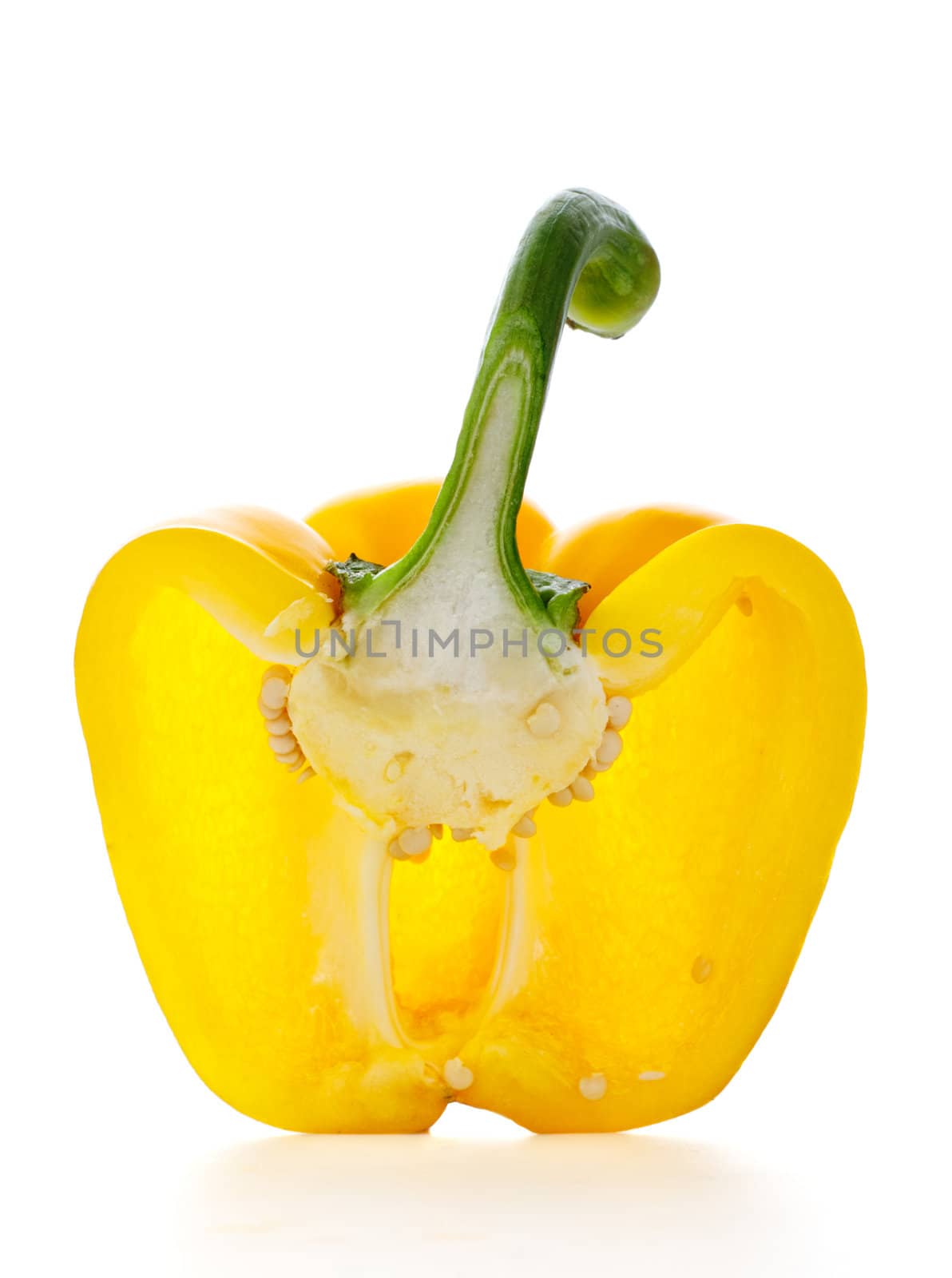 yellow paprika half isolated on white background