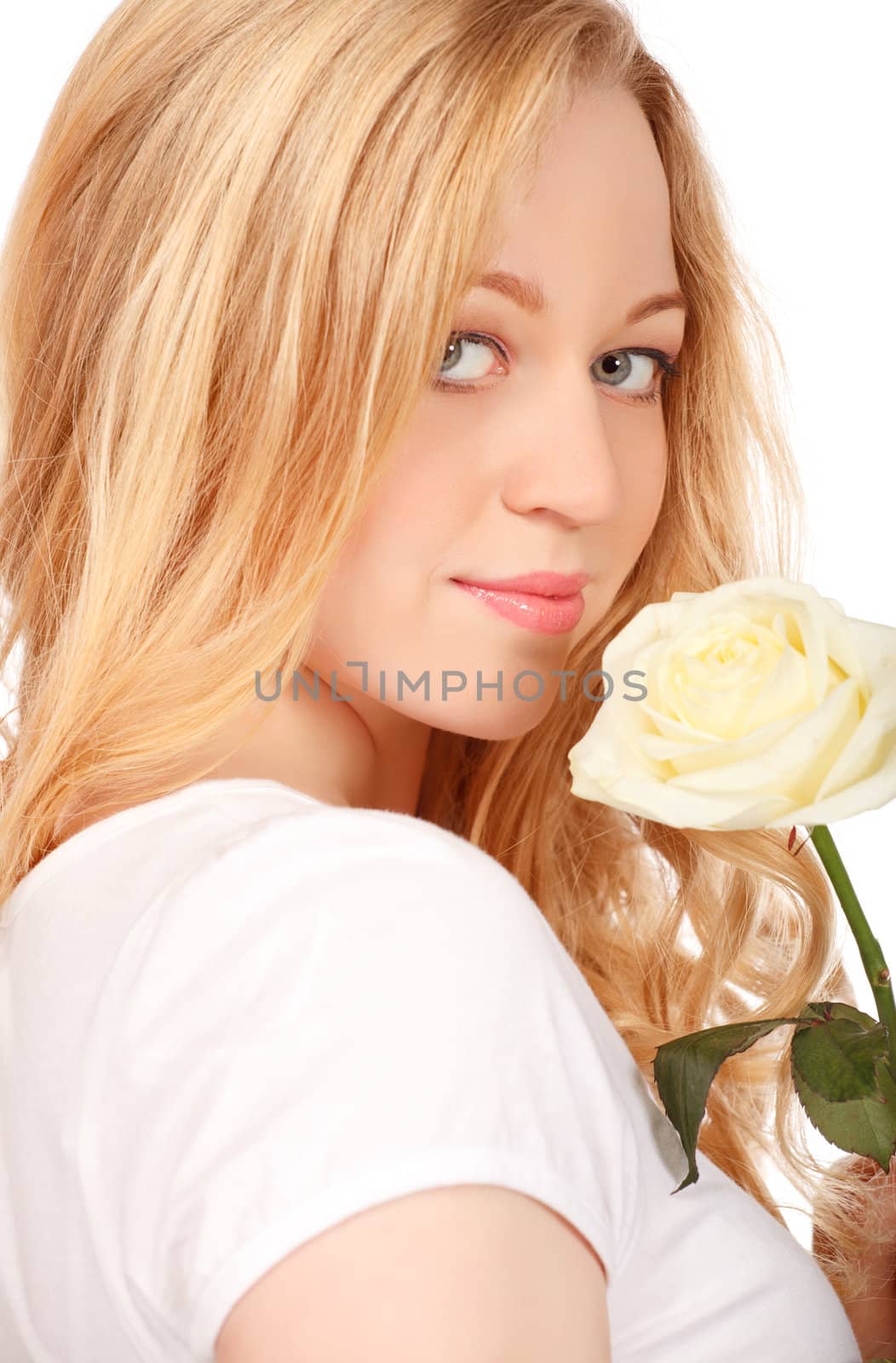 beautiful young woman with white rose, close-up portrait