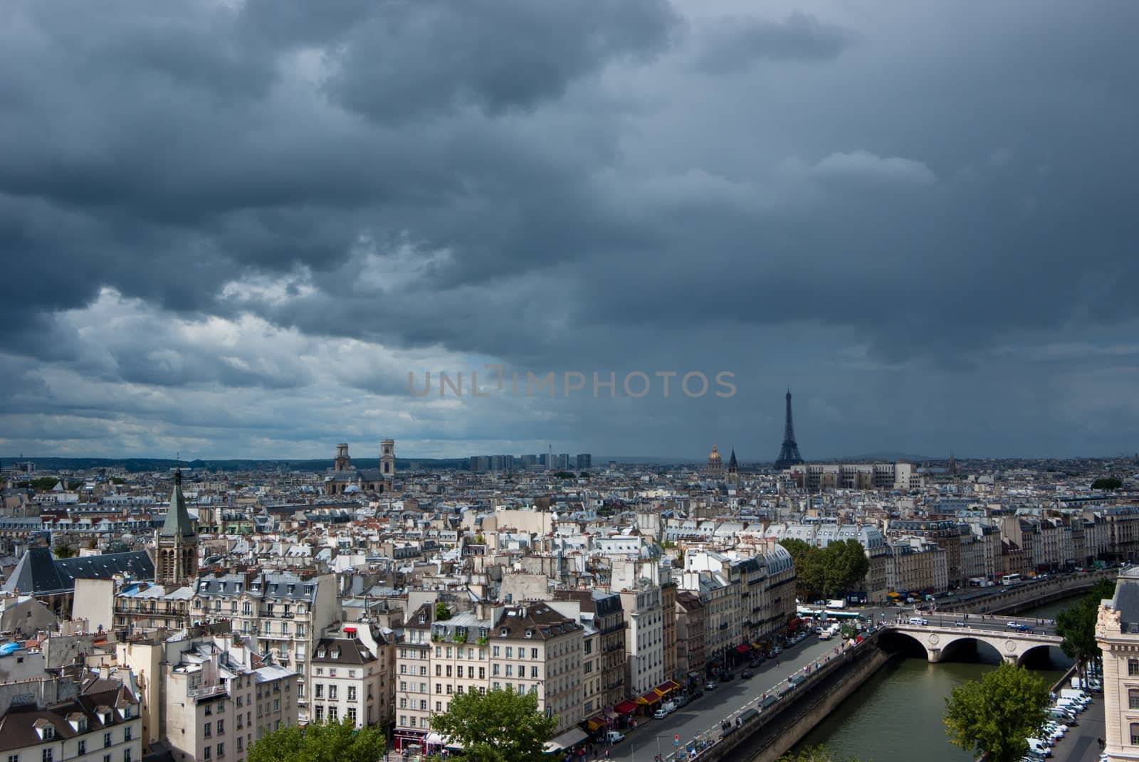 View on Paris from above. Eiffel tower on right, Montparnasse on the left in background