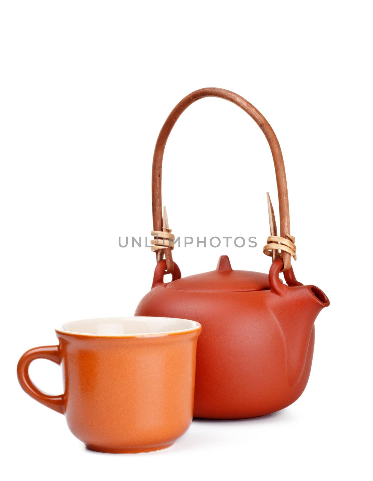 clay kettle and cup isolated on white