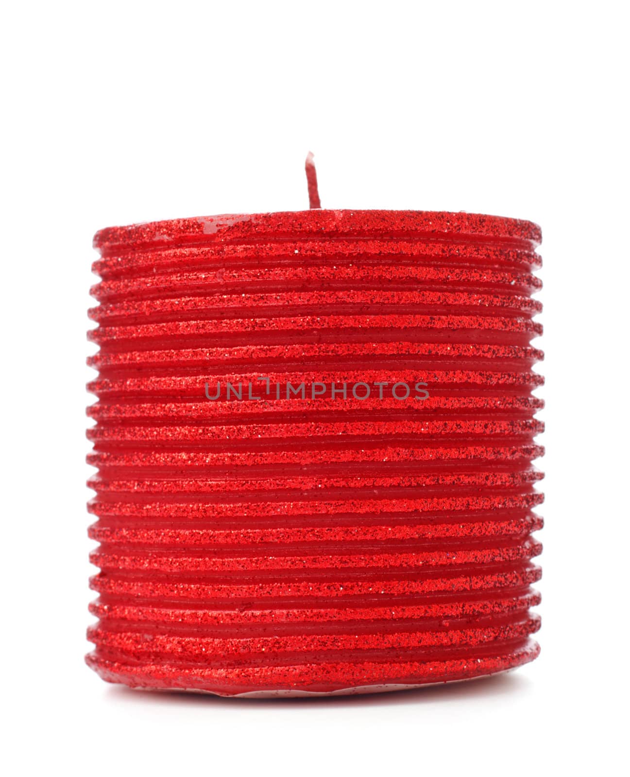 thick red christmas candle isolated on white background