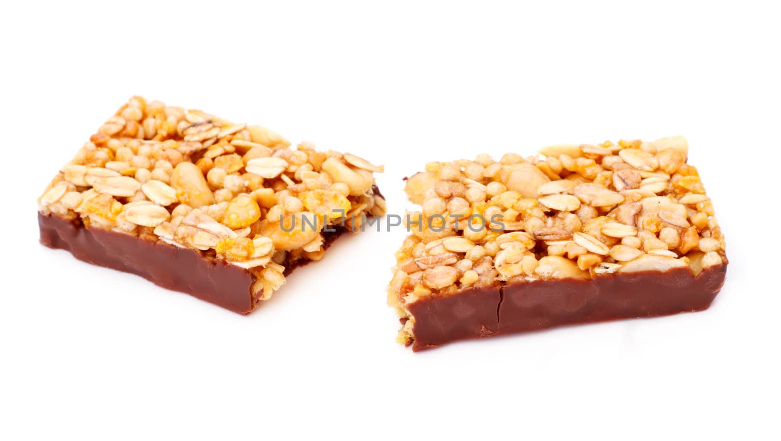 muesli bar in chocolate isolated on white