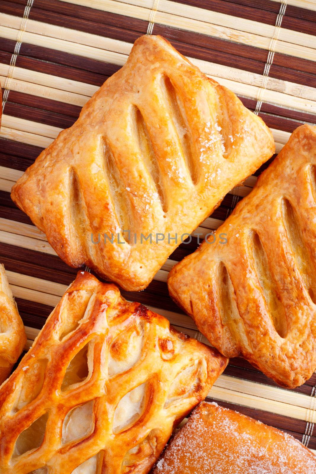 different types of biscuits on bamboo napkin, top view