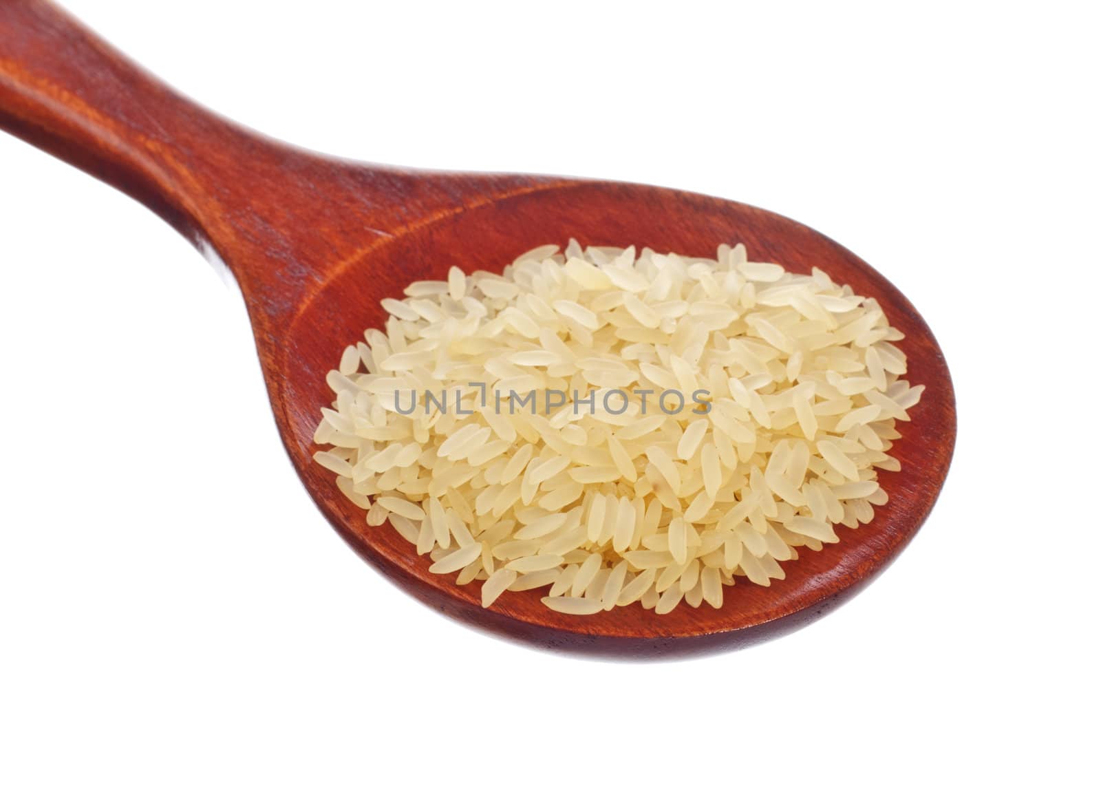 white rice in wooden spoon isolated on white background