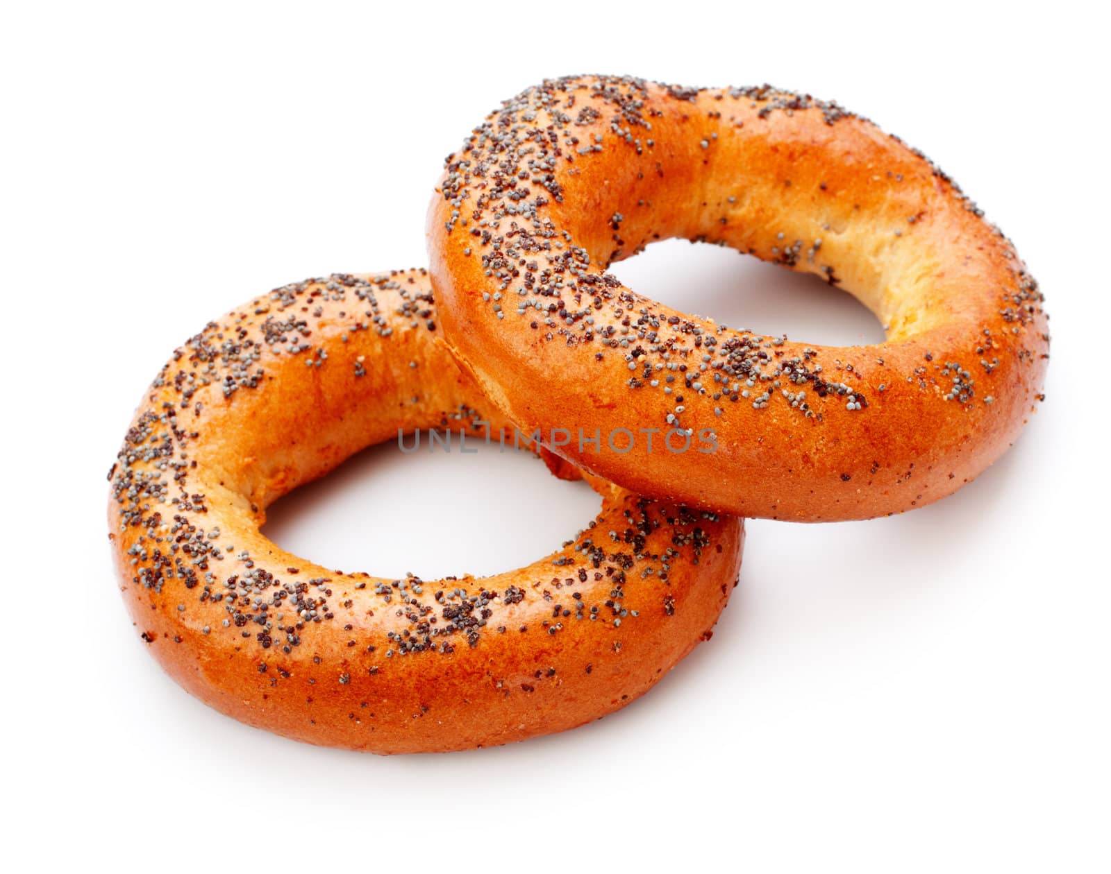 two bagels with poppy seeds isolated on white background