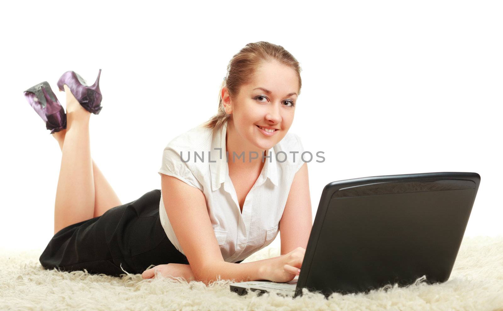 woman laying on floor with laptop computer