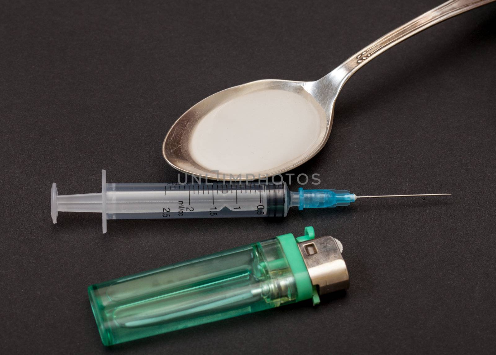 Syringe, spoon, heroin and lighter by Discovod
