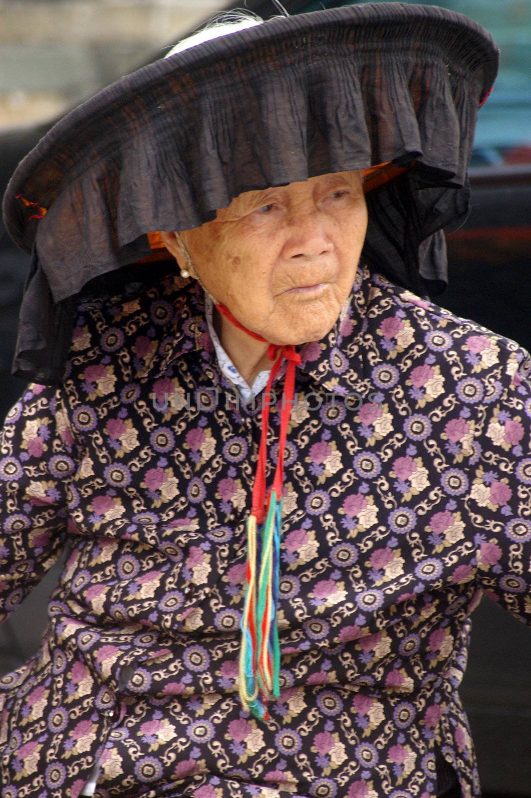 HONG KONG - FEB 22, A Hakka old woman in Kat Hing Wai of Hong Kong on 22 Feburary, 2009. They speak the Cantonese dialect Weitou dialect, rather than Hakka.