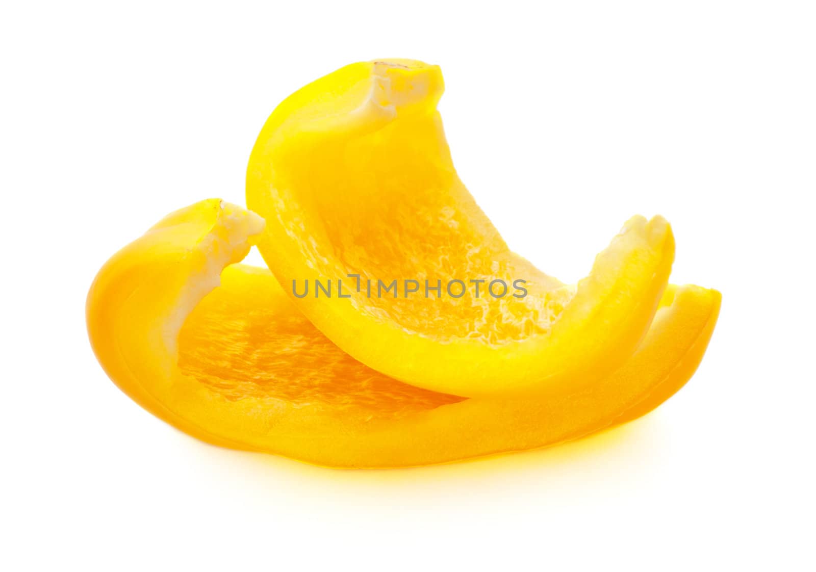yellow paprika slices isolated on white background