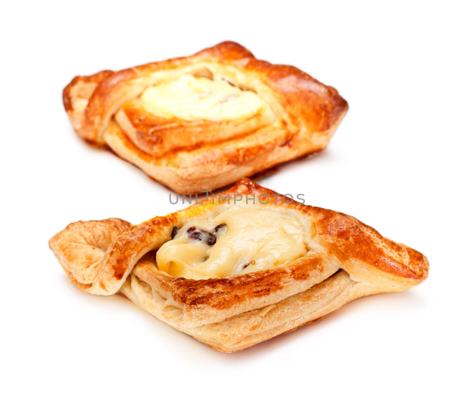 two pies with curds filling isolated on white