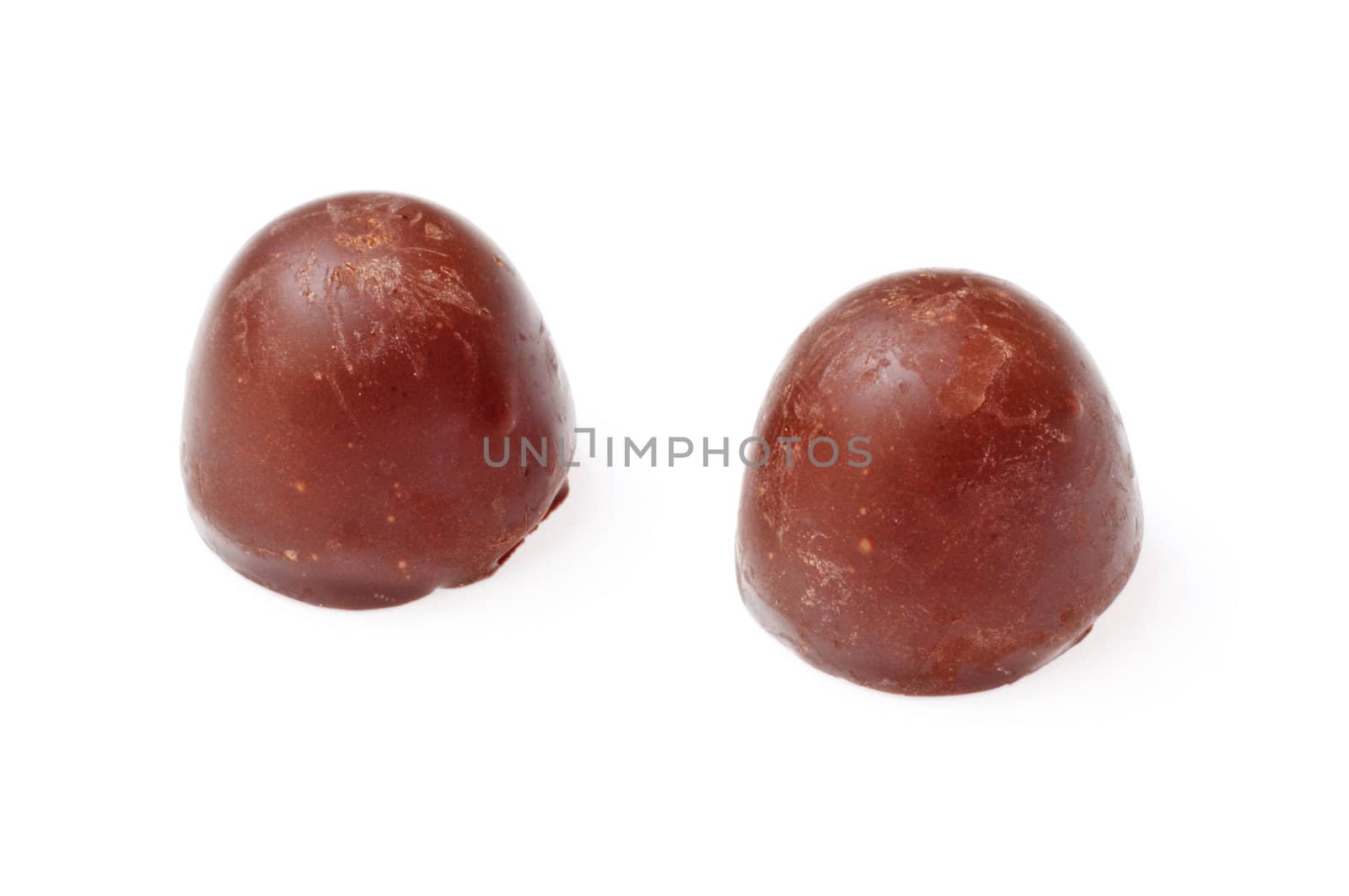 two chocolate candies isolated on white background