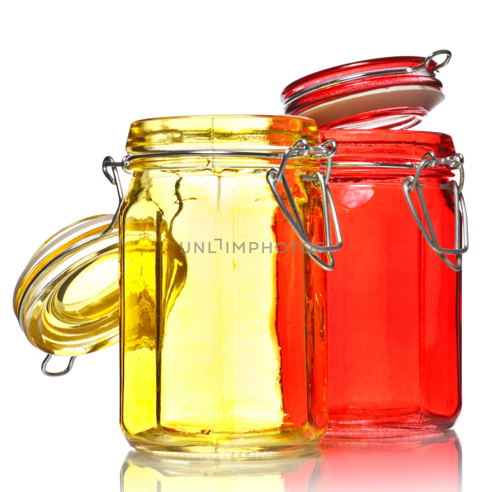 empty glass jars for spice isolated on white