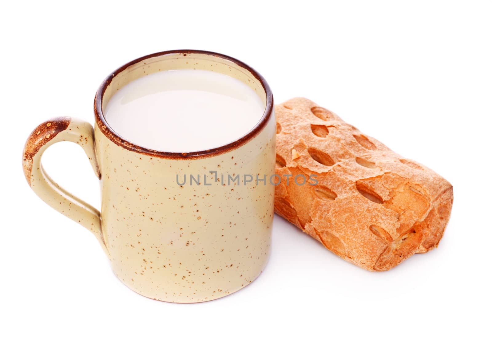 crispy bun and mug of milk isolated on white