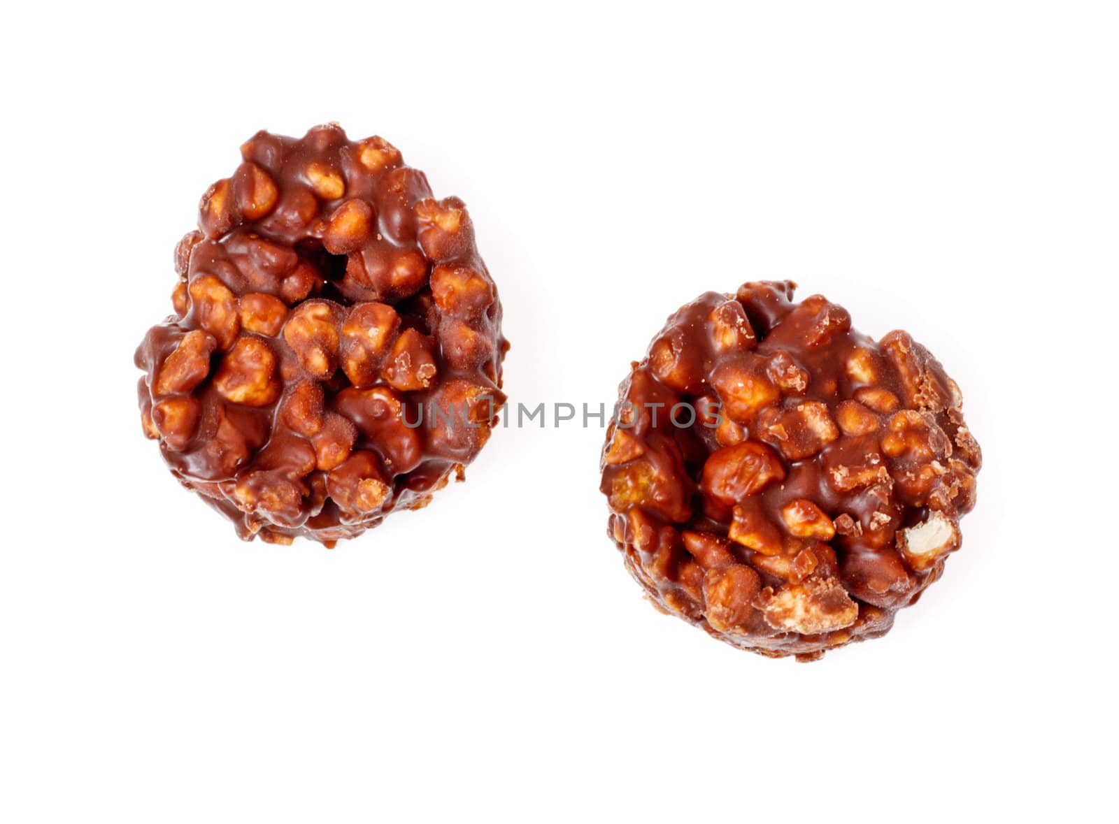 chocolate candies with nuts isolated on white