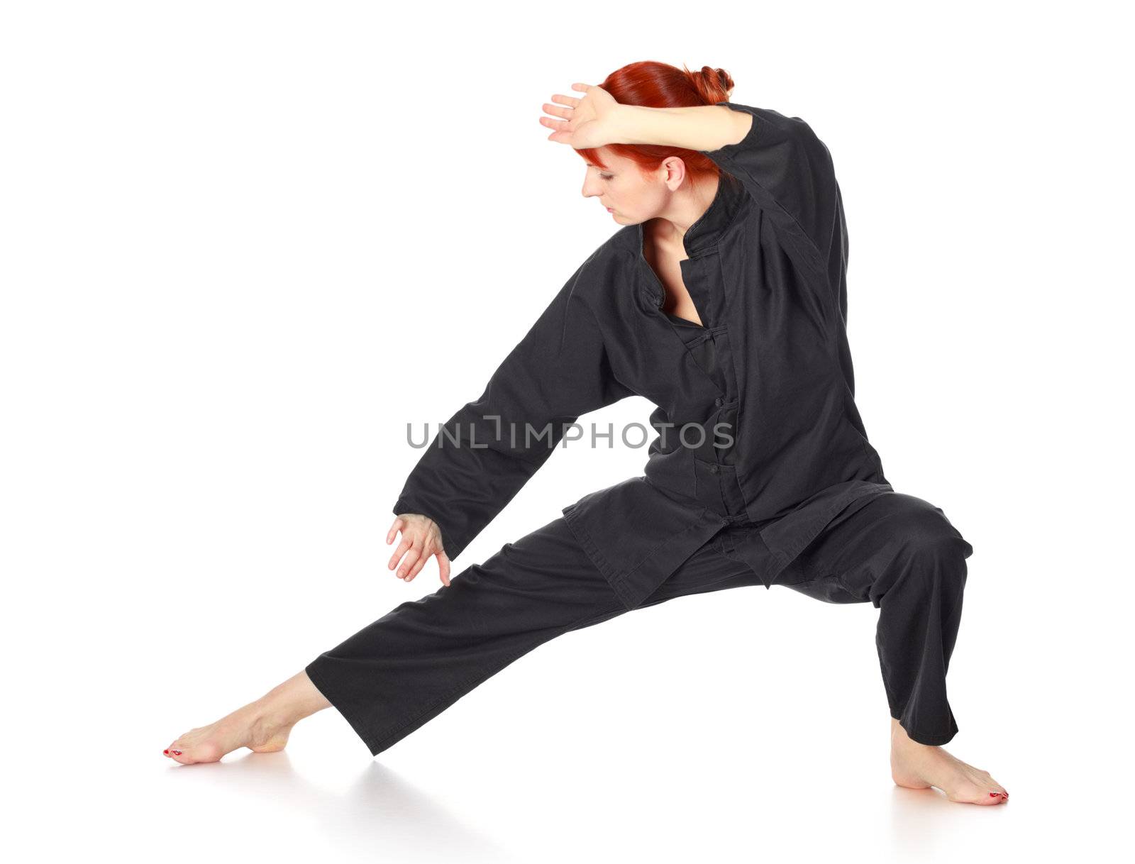 girl in black kimono exercise, isolated on white