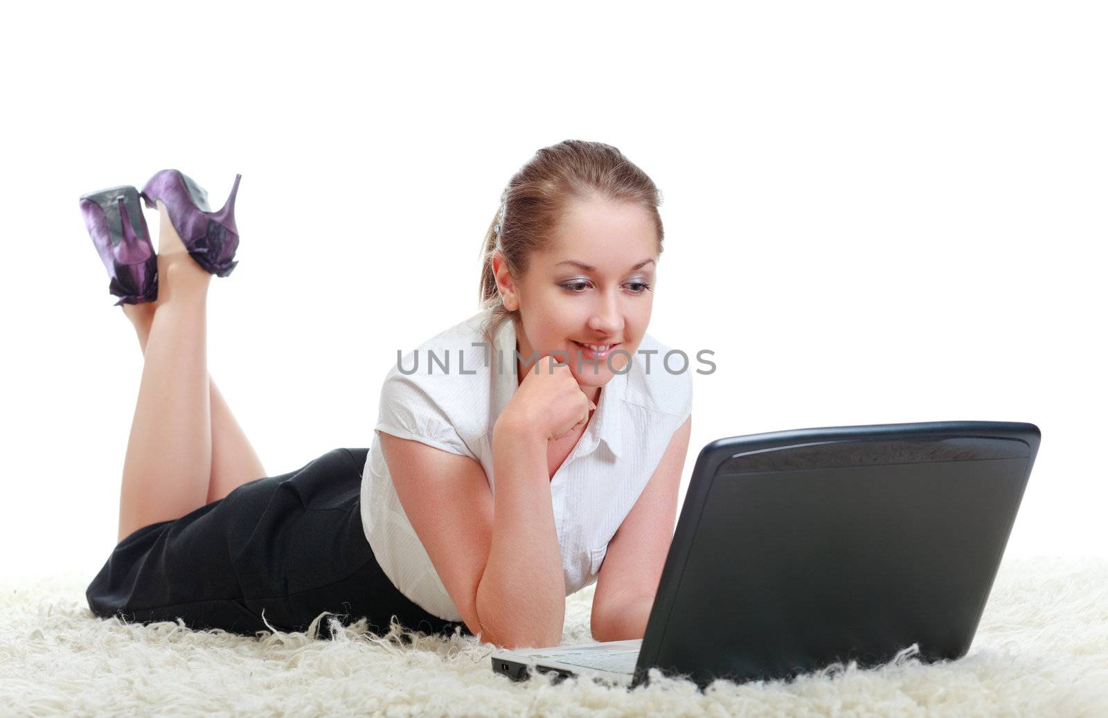 woman laying on floor with laptop computer