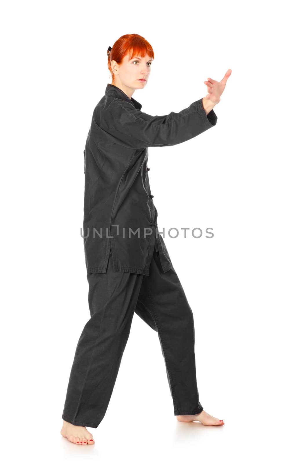 girl in black kimono exercise, isolated on white