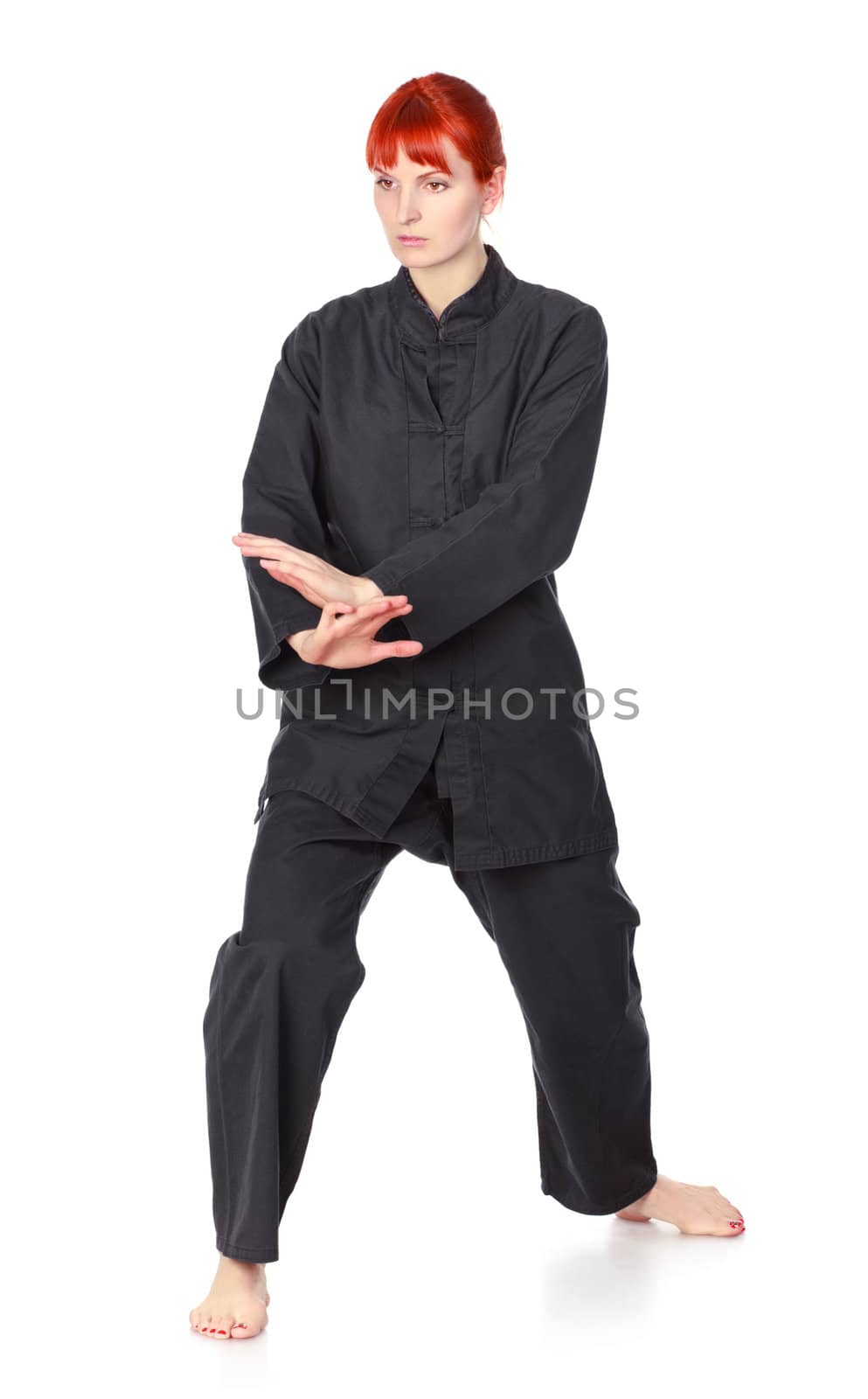 girl in black kimono exercise, isolated on white