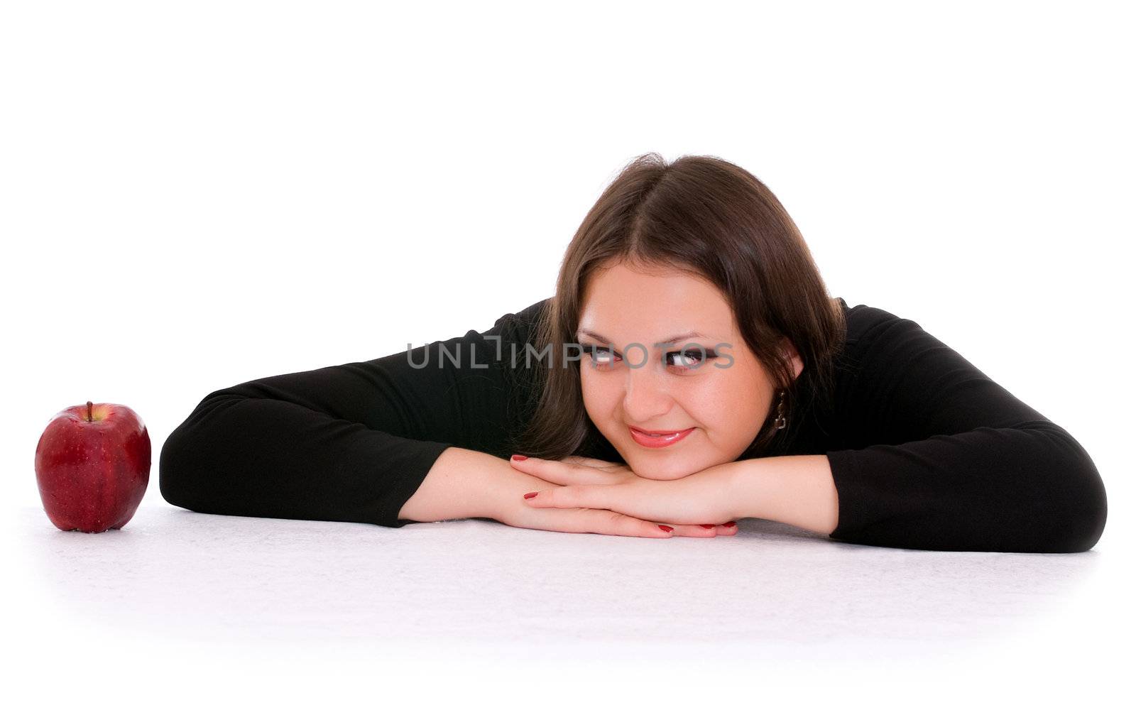 girl staring at the red apple isolated on white