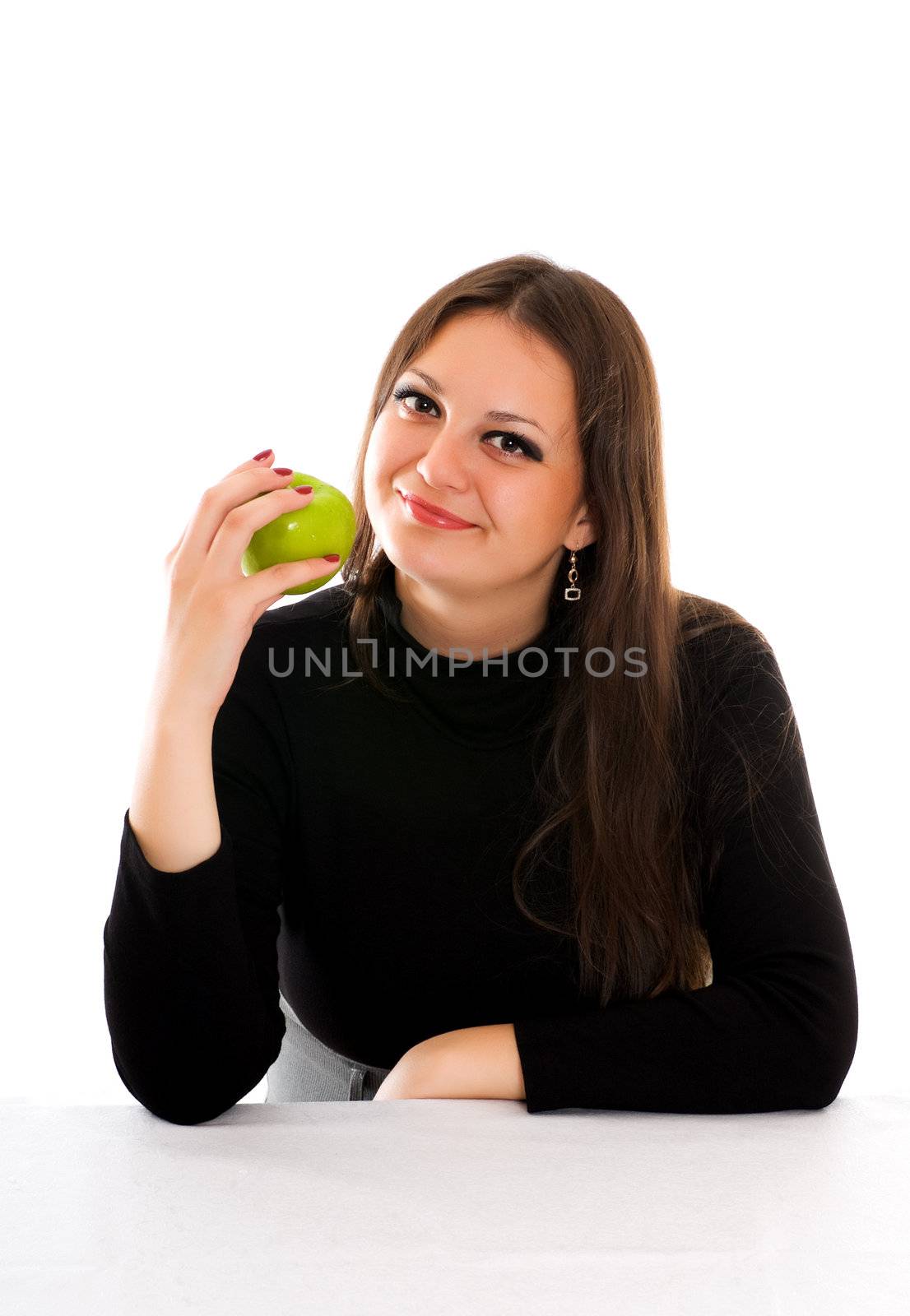 smiling young woman green apple sitting at the table