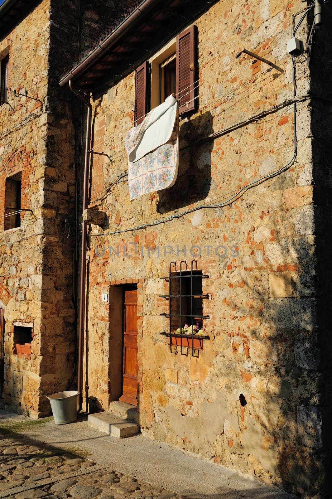 Typica house in tuscan medieval village of Monteriggioni