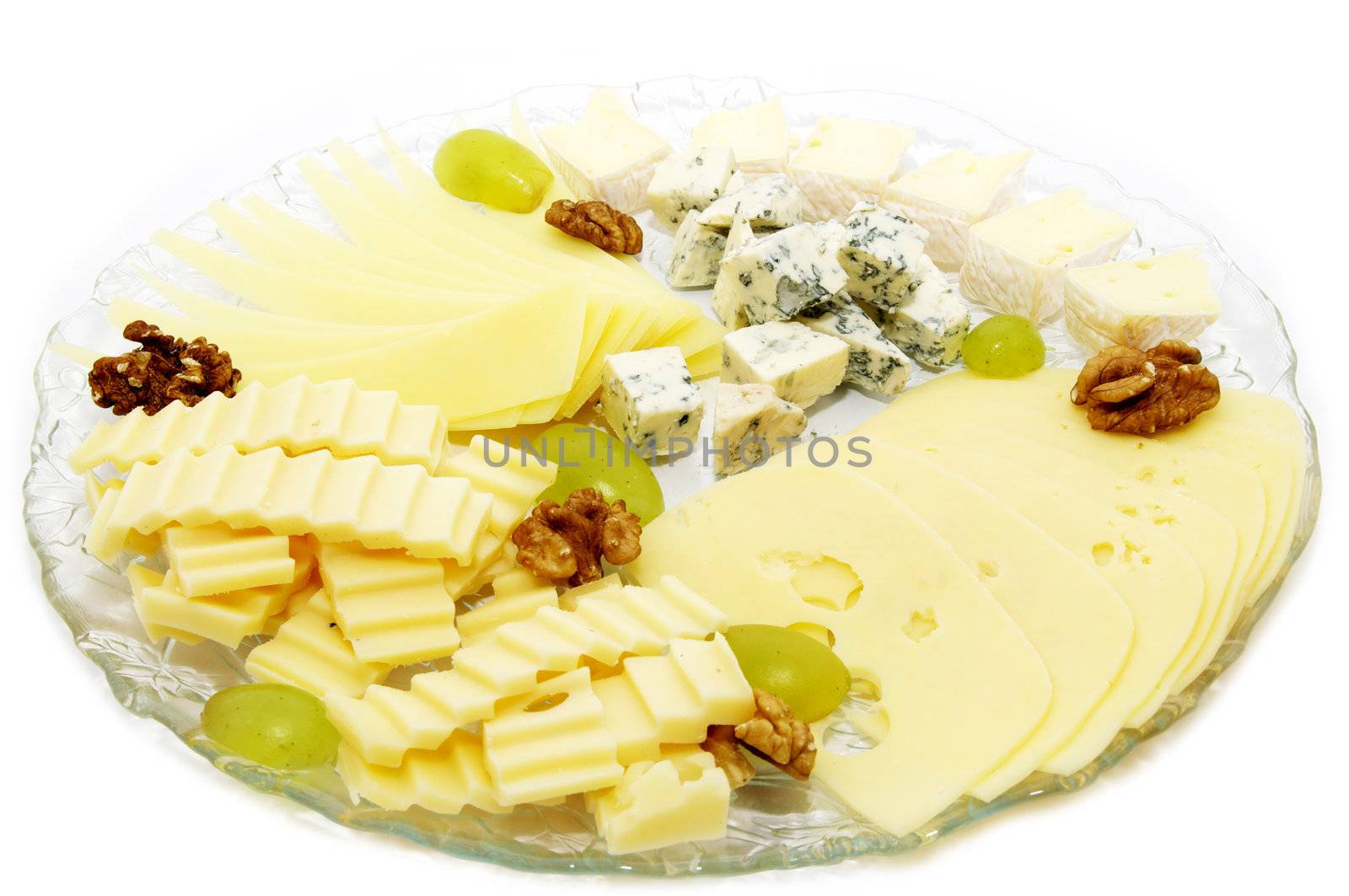 cheese plate with several kinds of cheese on a white background