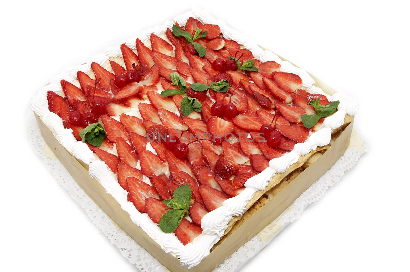 a large strawberry cake on white background