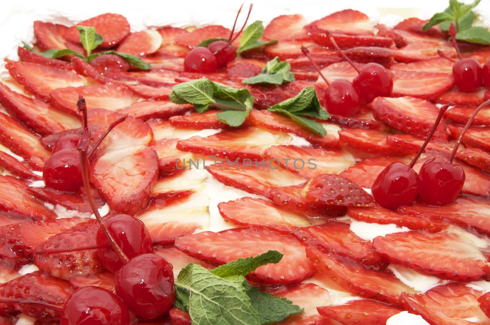 surface of the strawberry cake on white background