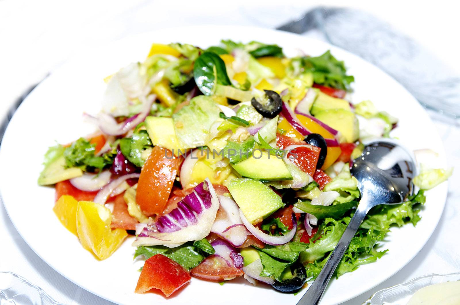 on a plate vegetable salad on the table