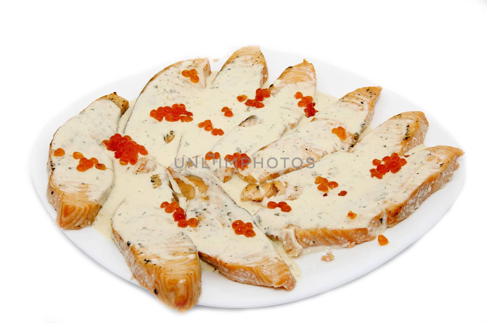 fried fish with sauce and caviar on a white background