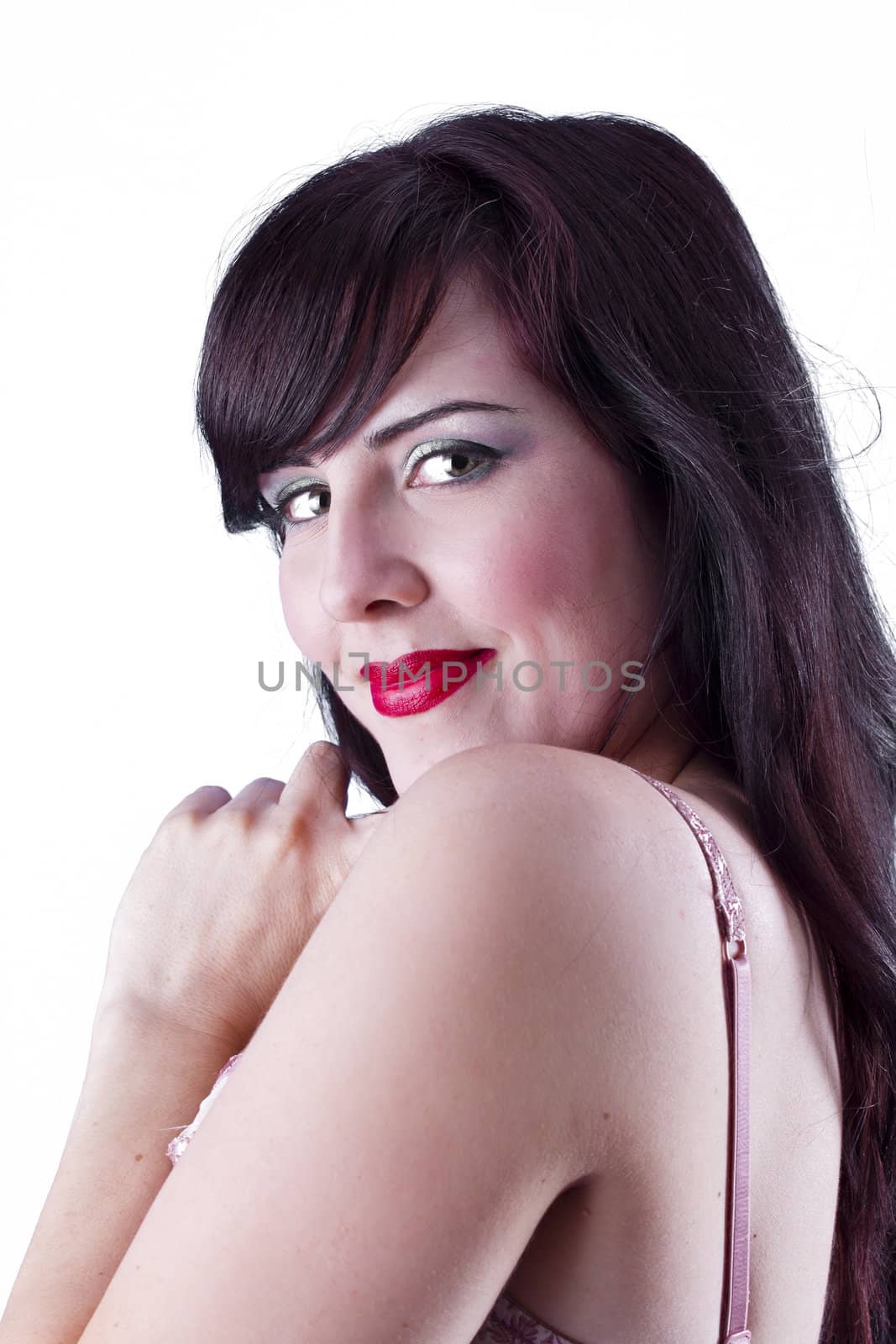 Portrait of young beautiful woman with hand on cheek, isolated