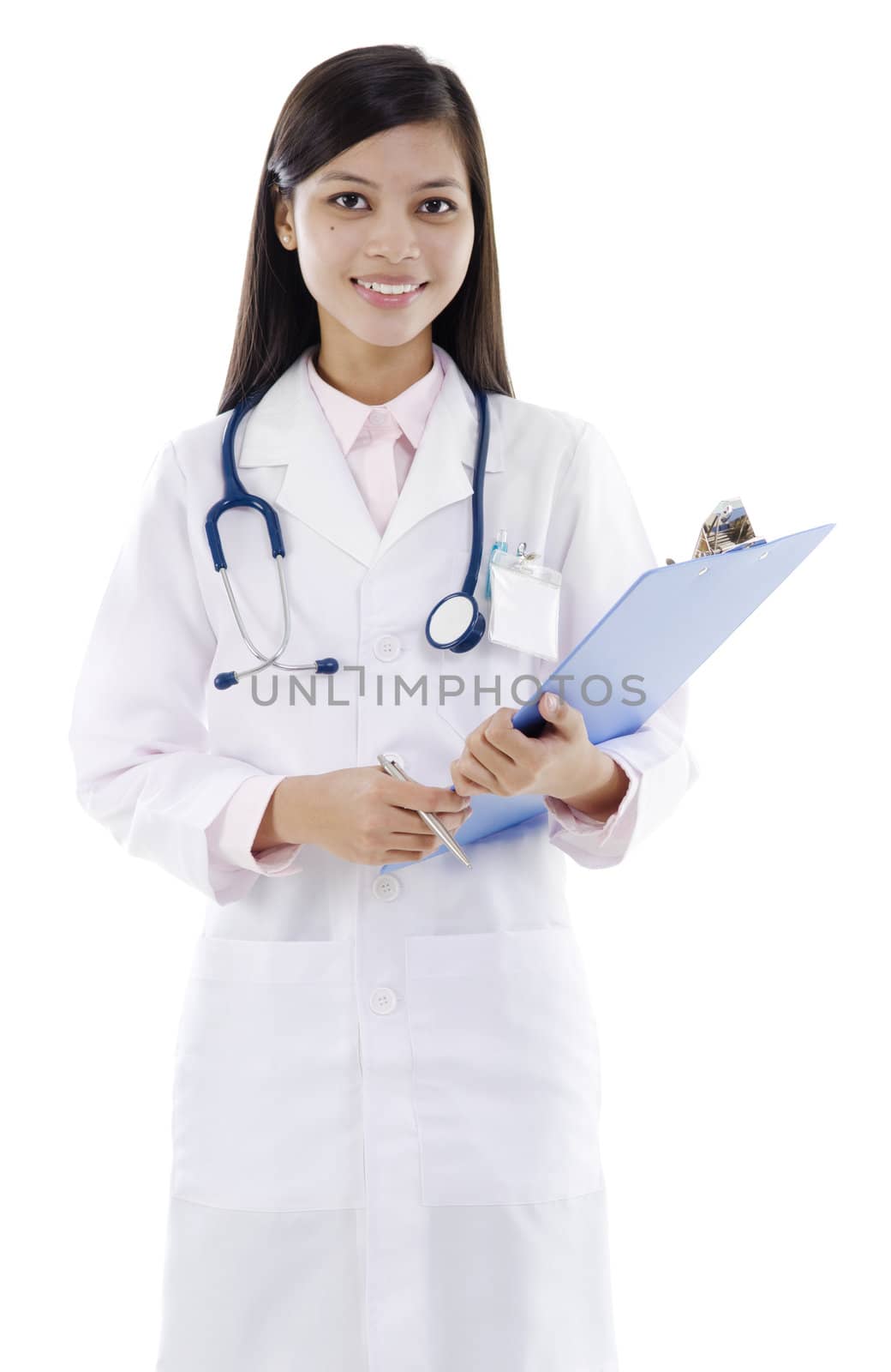 Young female doctor holding a writing pad