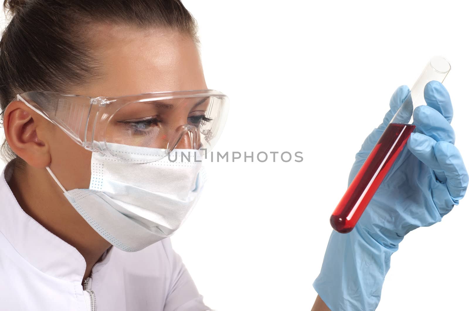 young beautiful woman scientist works in lab