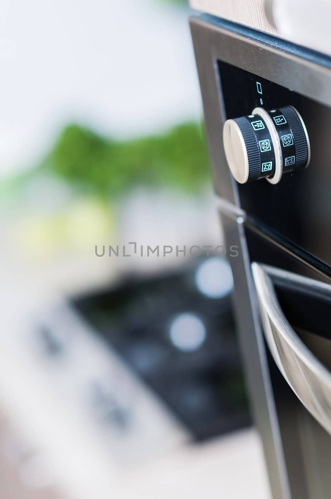 controls on the oven for a close-up. vertical view